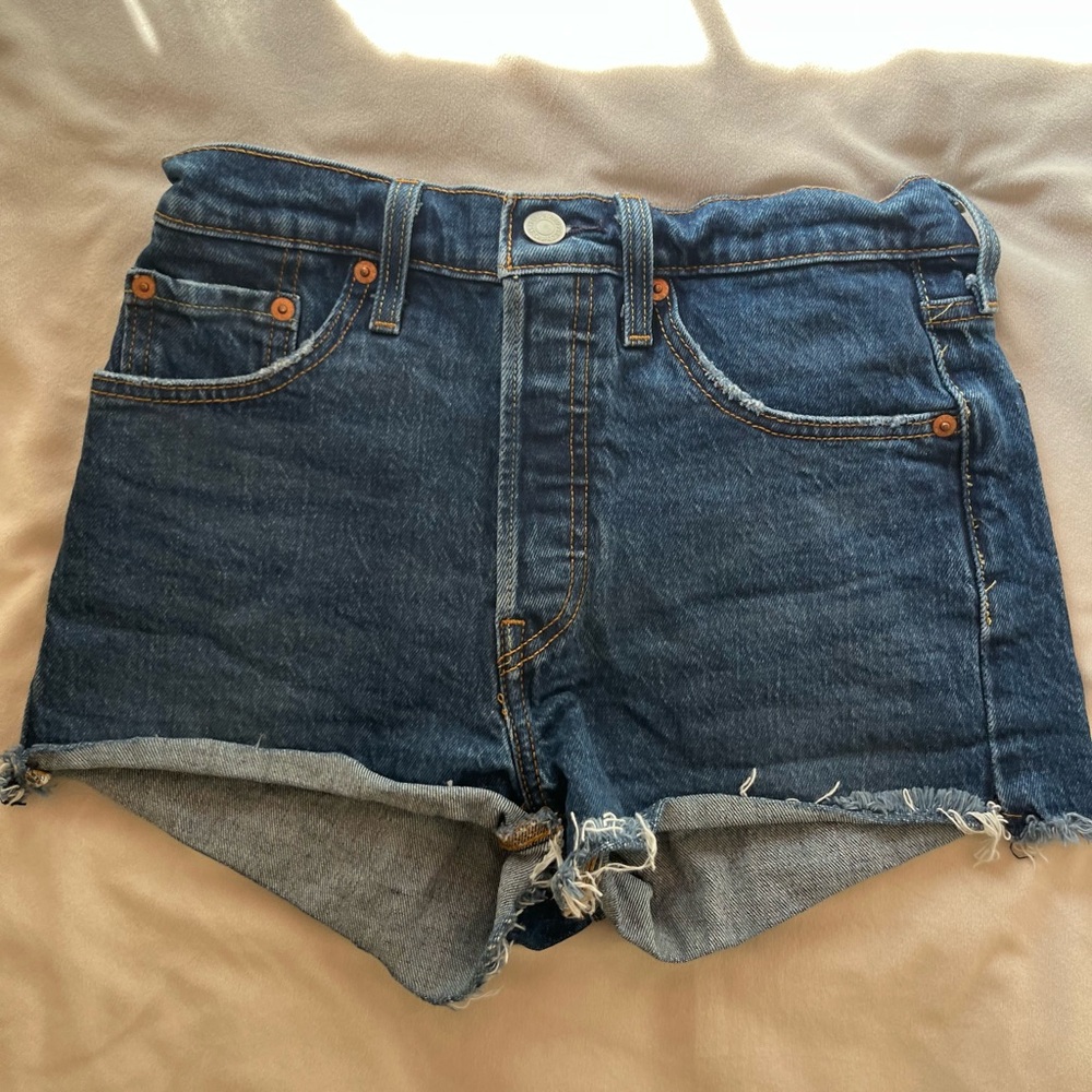Levi's Blue Jean Shorts with Distressed Hem and Cut-Off Style